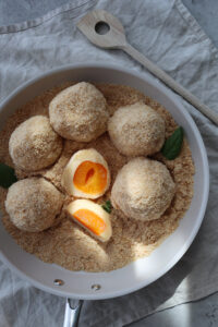 Hausgemachte Marillenknödel mit Topfenteig